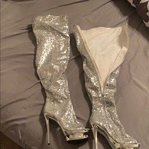 Thigh high heeled boots